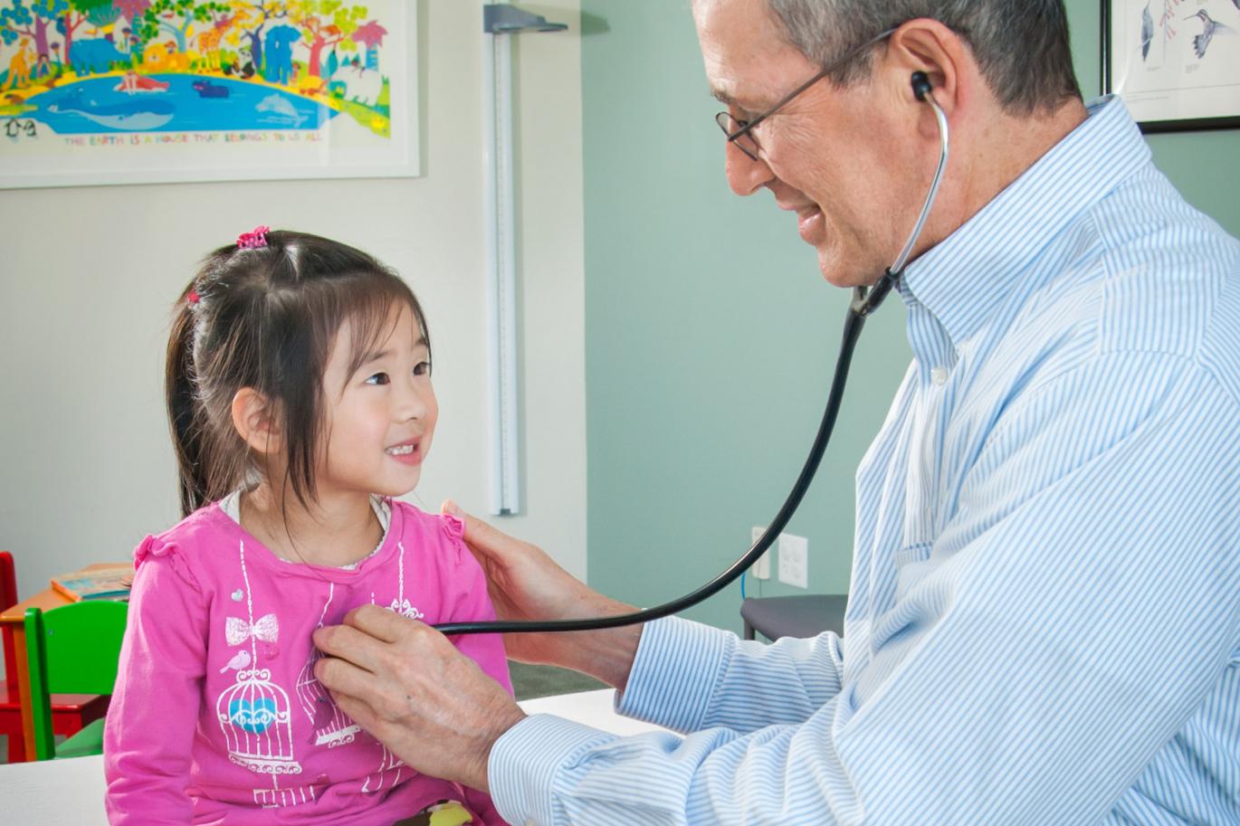 Dr. Newmark cares for a pediatric patient