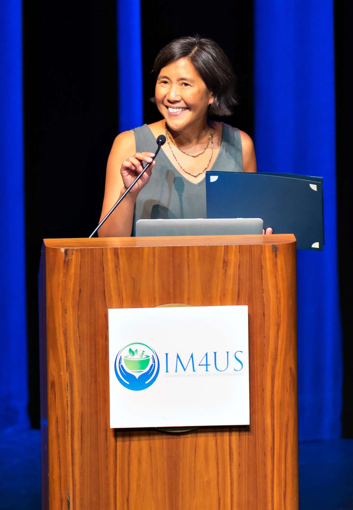 Dr. Maria Chao welcoming IM4US attendees. Photo by Kathleen Harrison.