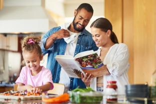 A family cooking a meal together