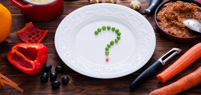 Plate with peas in the shape of a question mark