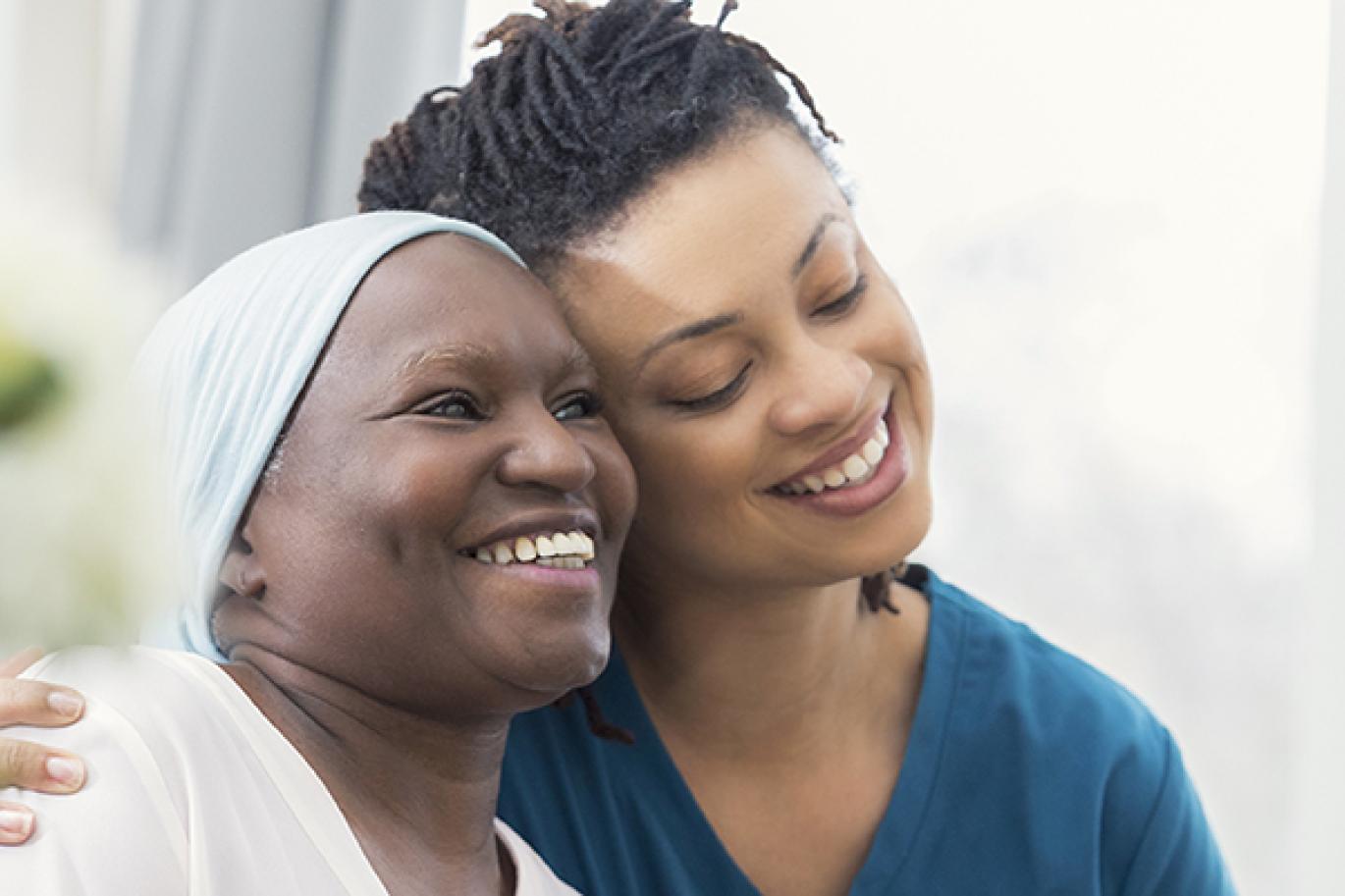 Two women smiling