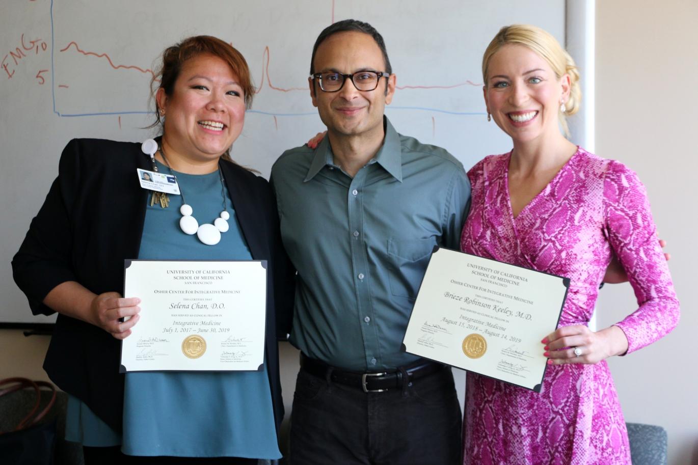 Clinical Fellows receive certificates from Education Director